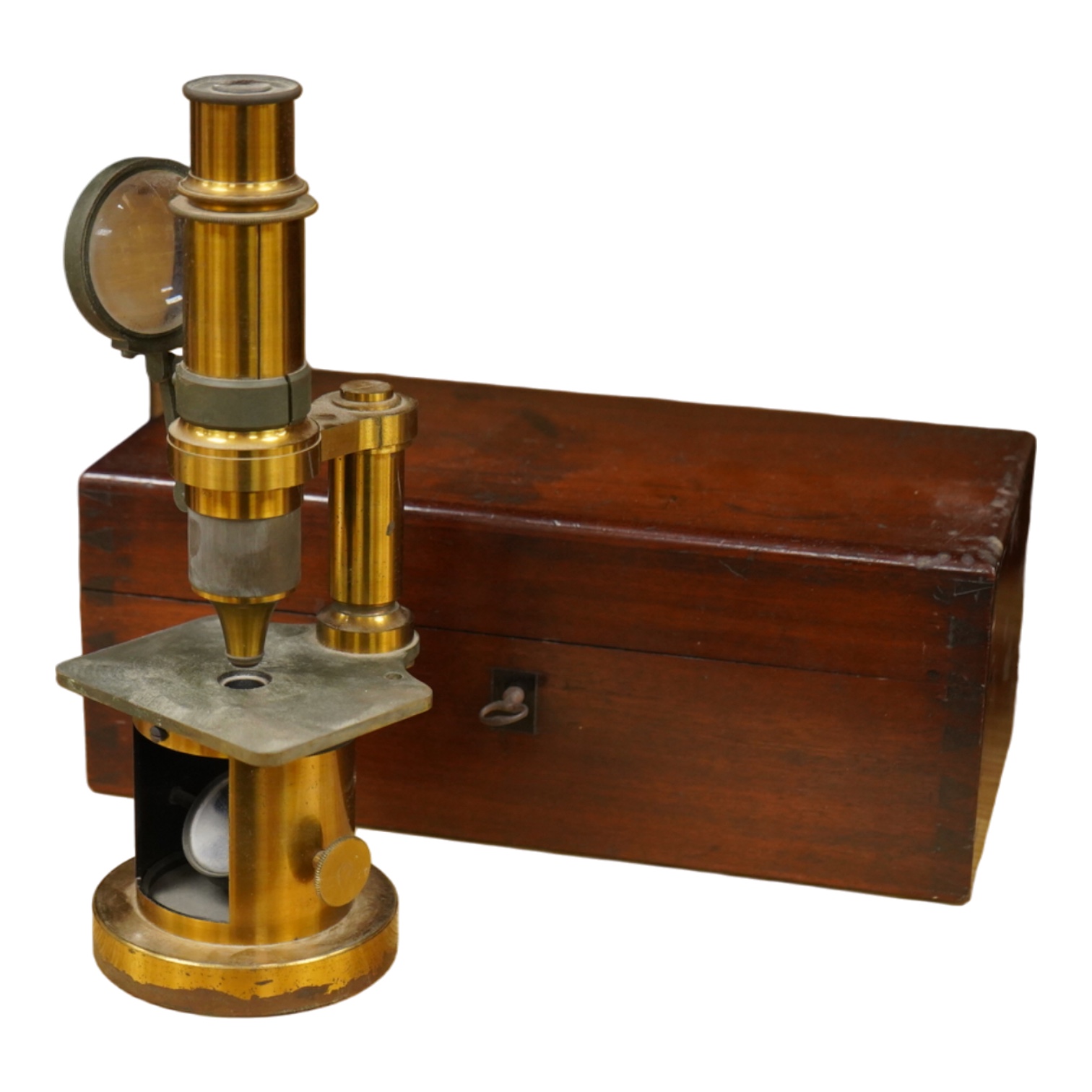 A mid 19th century French brass compound monocular microscope, by G. Oberhaeuser & E. Hartnack, Place Dauphine, Paris, number 2953, with an additional eyepiece, an objective and small box of slides, mahogany case 25.5cm